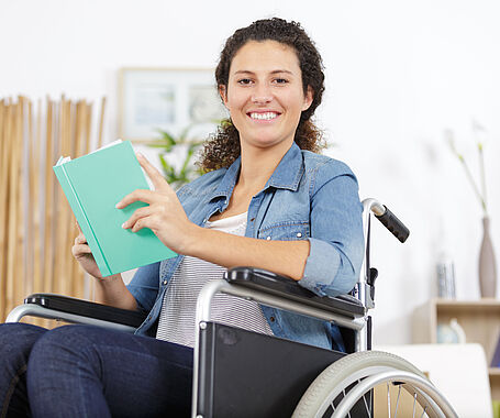 young disabled woman in wheelchair with