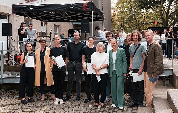 Gruppenfoto der Preisträger des Prix de Schlü 2023 mit den Juroren